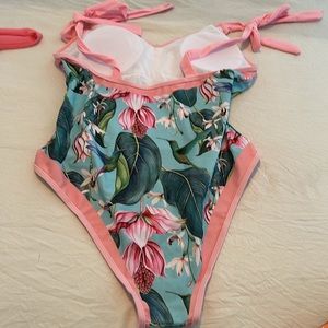 One piece bathing suit. Beautiful tropical print!